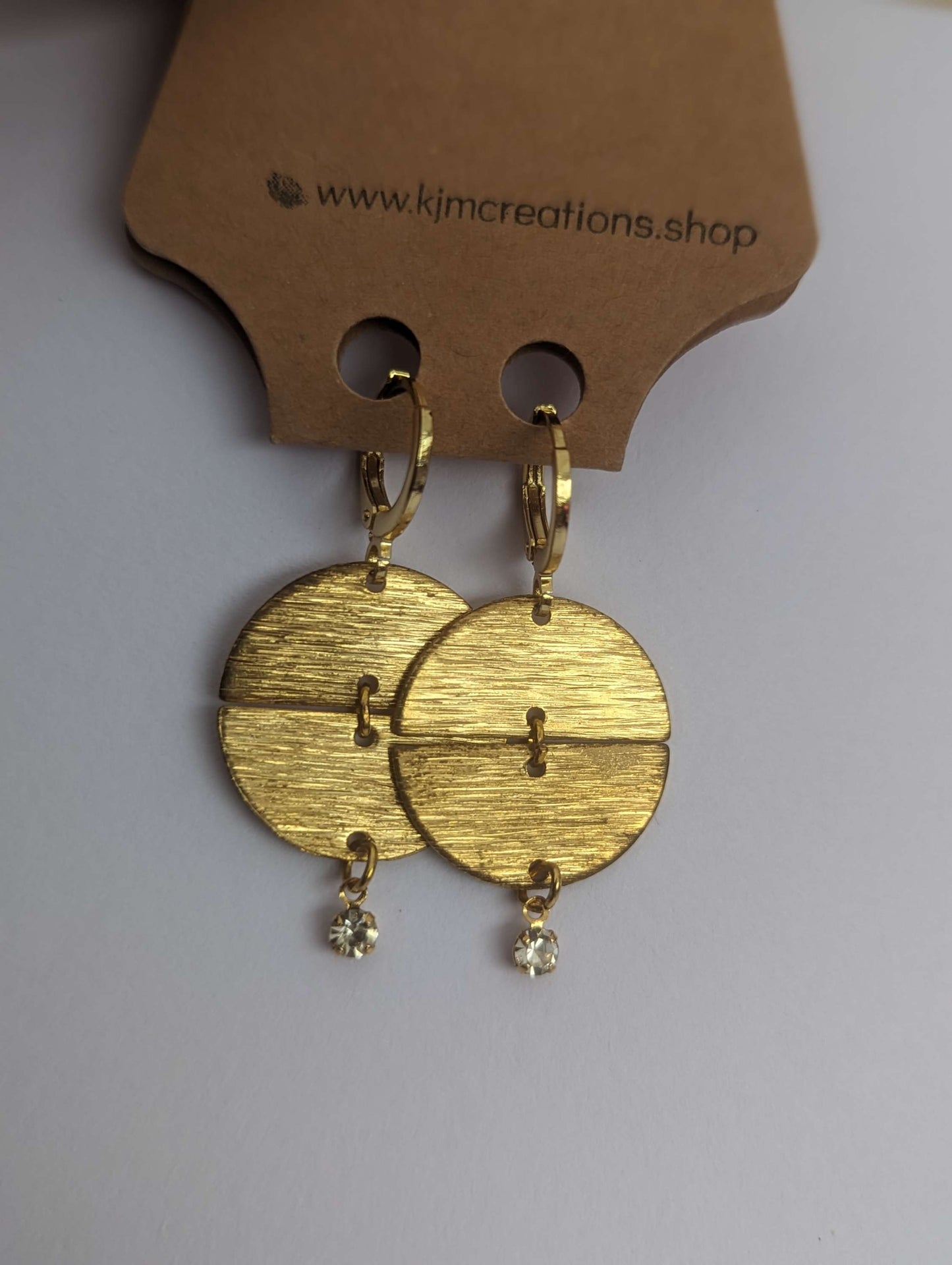 Huggie gold hoop image 1